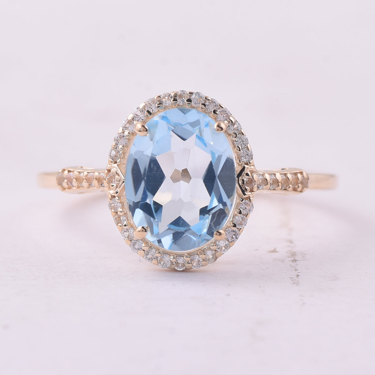 2.24 Ct Oval Blue Topaz 9K Gold Ring
