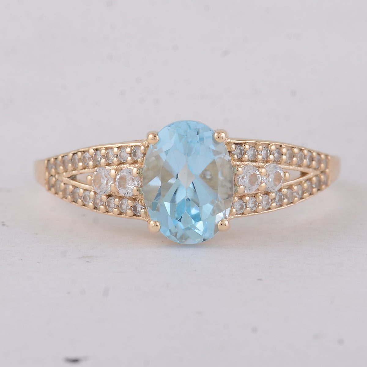 1.75 Ct Oval Blue Topaz 9K Gold Ring