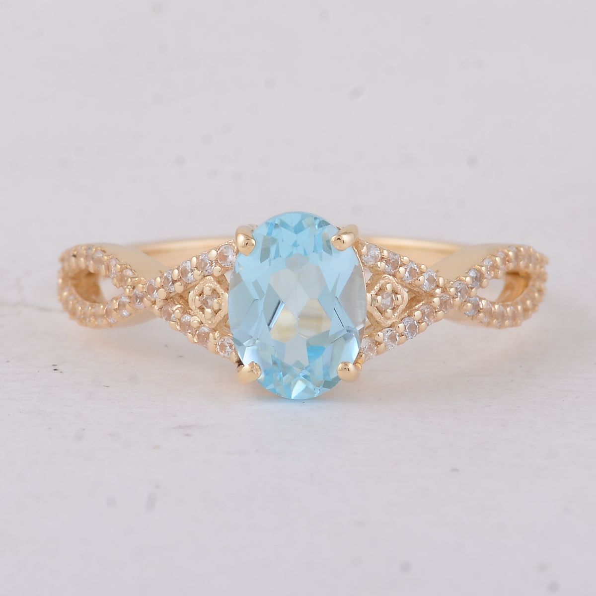 1.60 Ct Oval Blue Topaz 9K Gold Ring