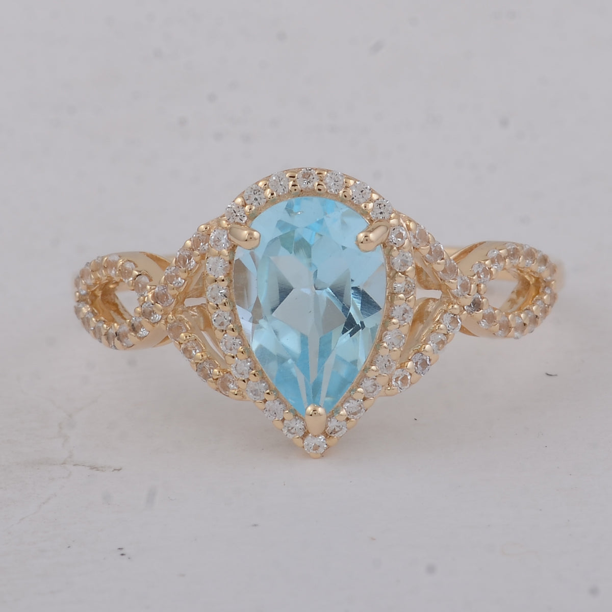 1.87 Ct Pear Blue Topaz 9K Gold Ring