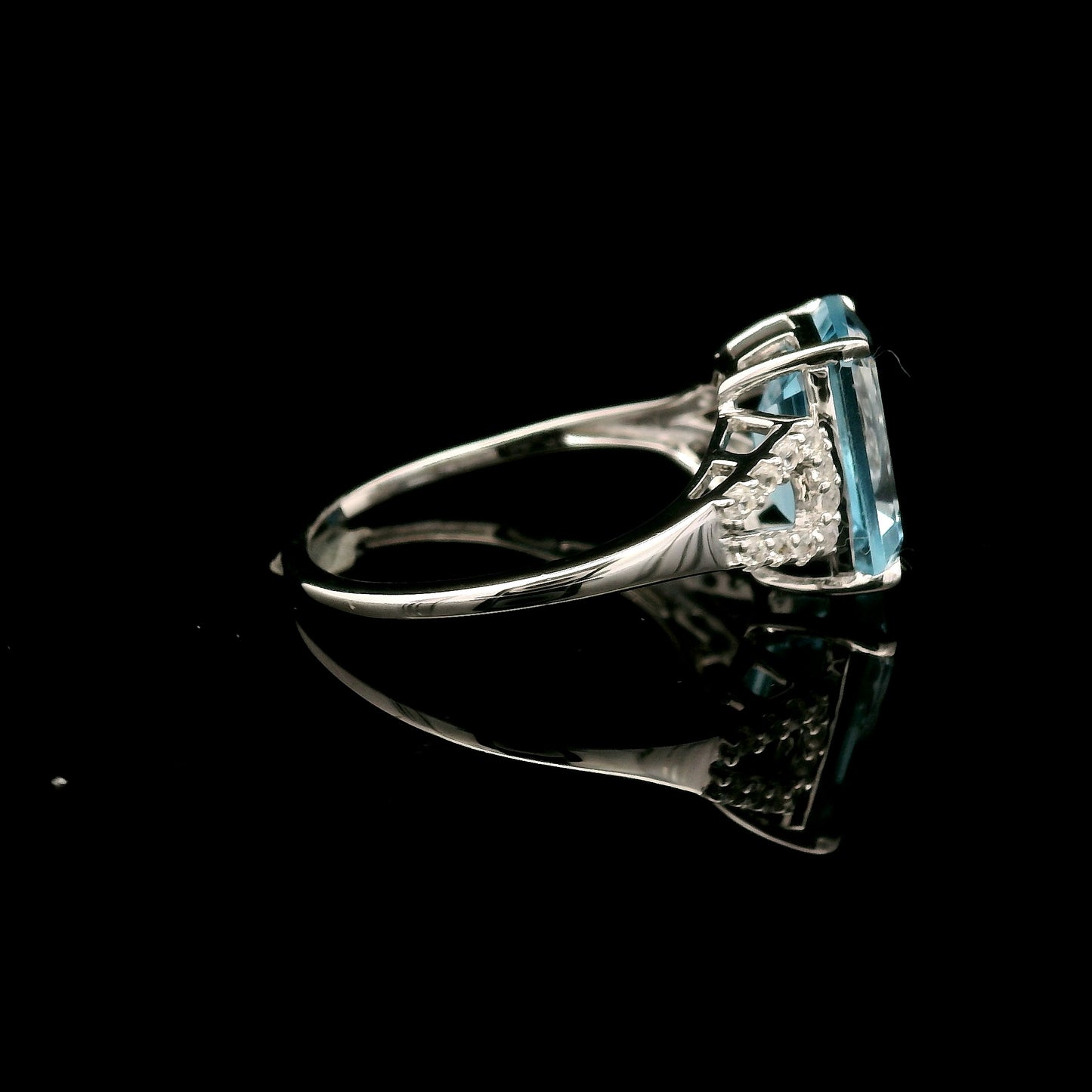 4.33 Ct Octagon Blue Topaz, White Zircon 925 Sterling Silver Ring
