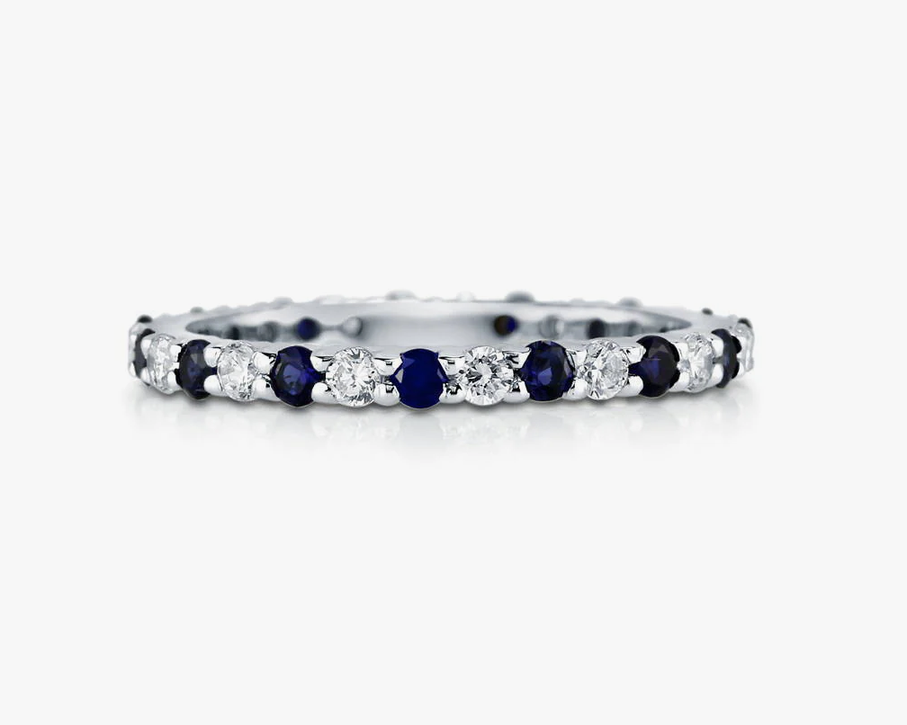Simulated Blue Sapphire Pave Set CZ Eternity Ring in Sterling Silver