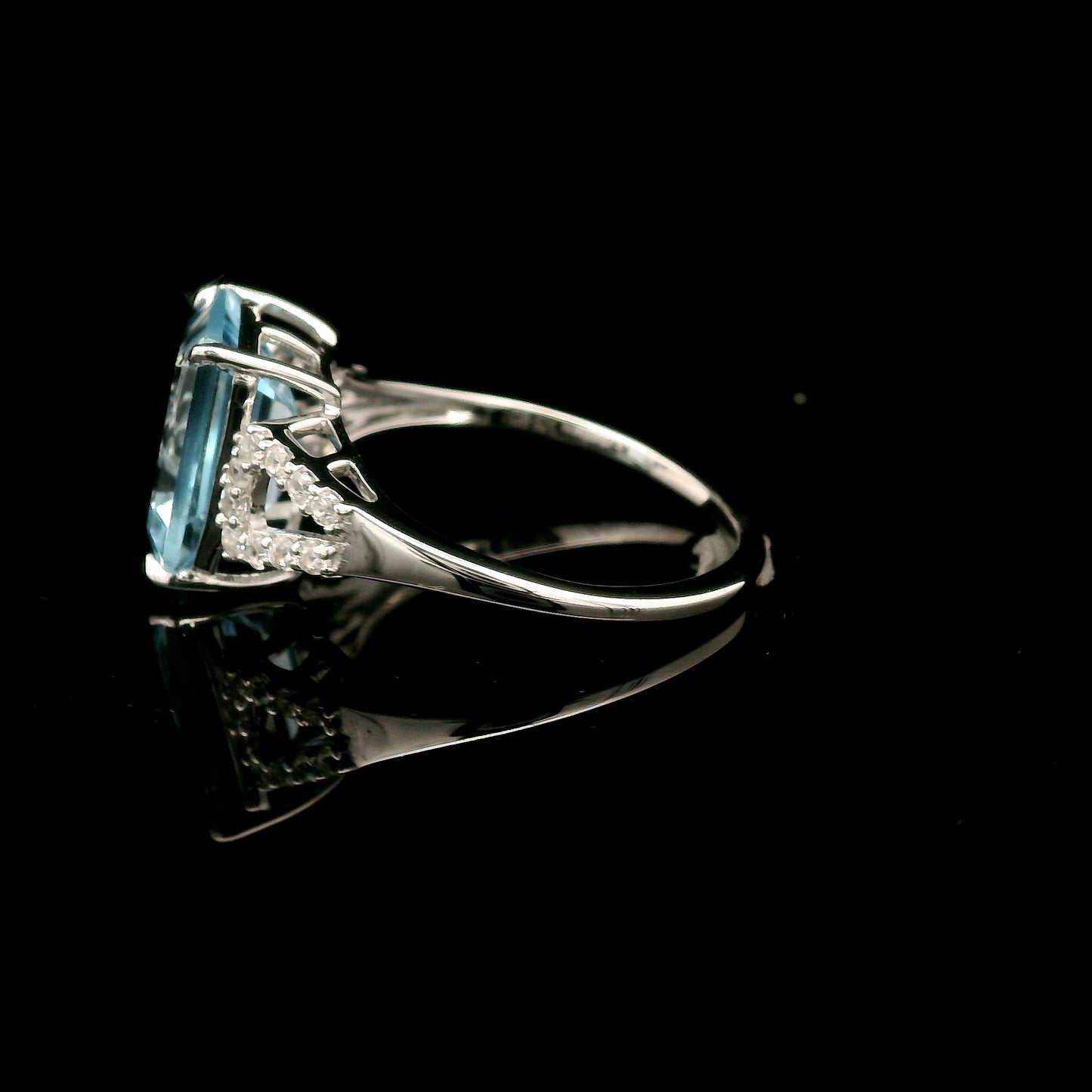 4.33 Ct Octagon Blue Topaz, White Zircon 925 Sterling Silver Ring