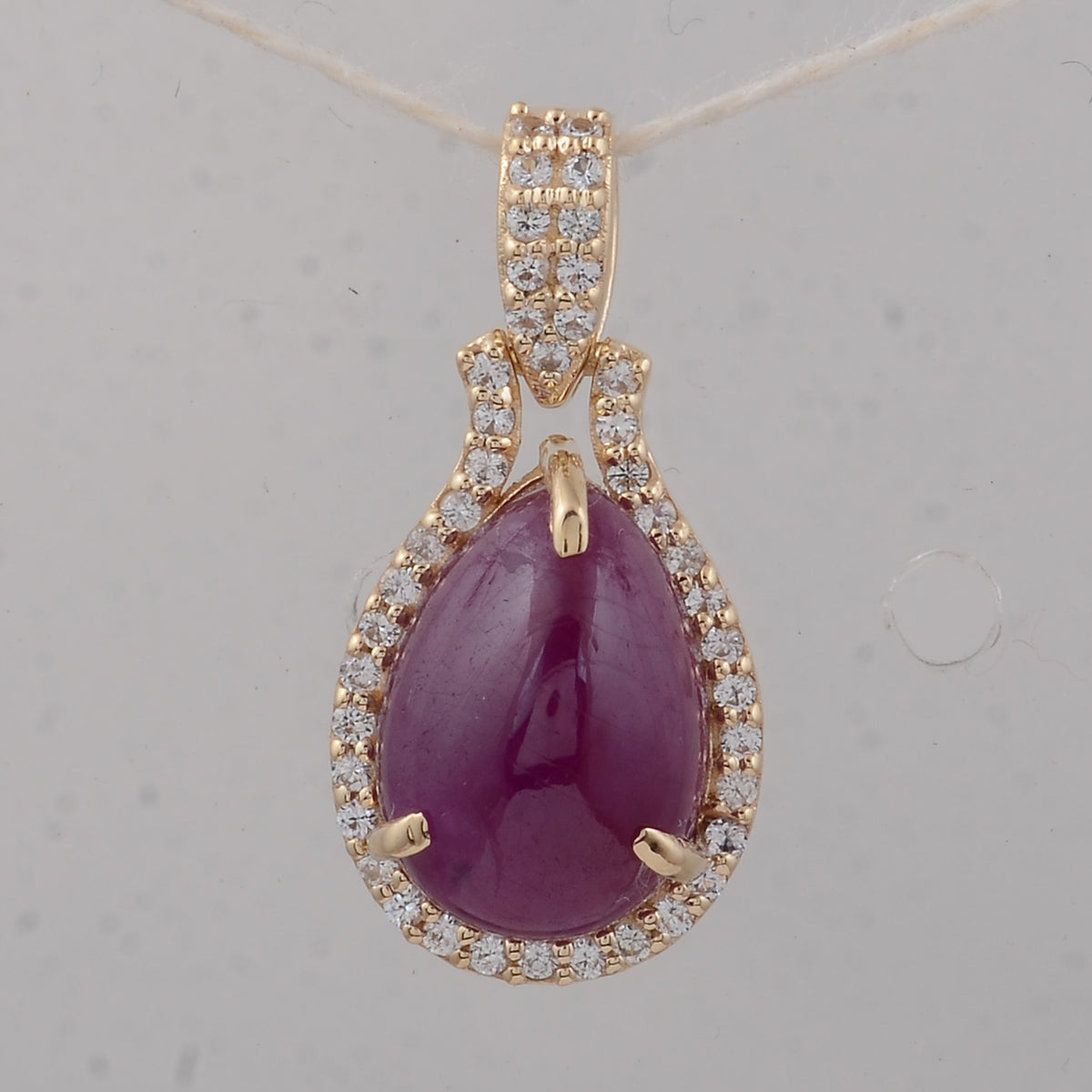 3.85 Ct Pear Ruby 9K Gold Pendant