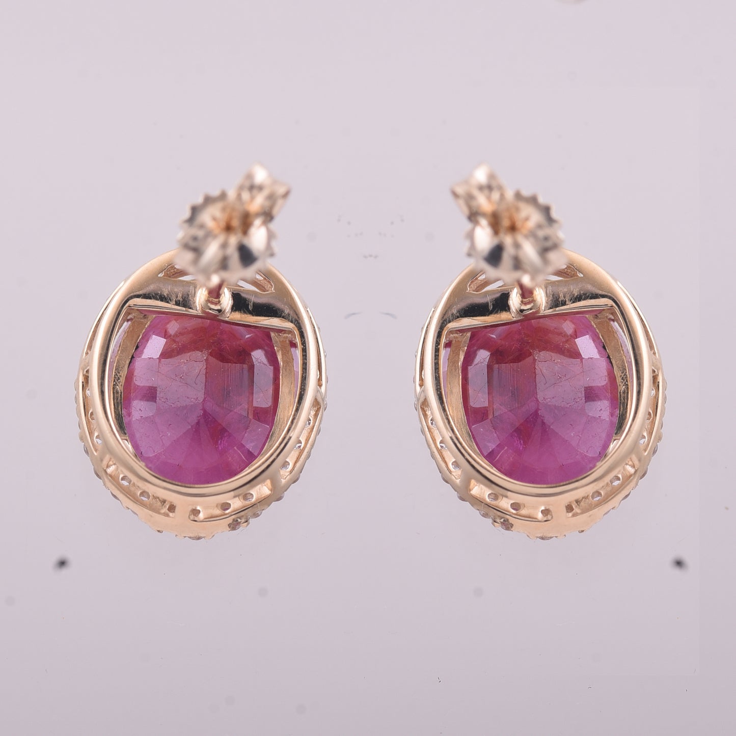 5.22 Ct Oval Ruby 9K Gold Earrings