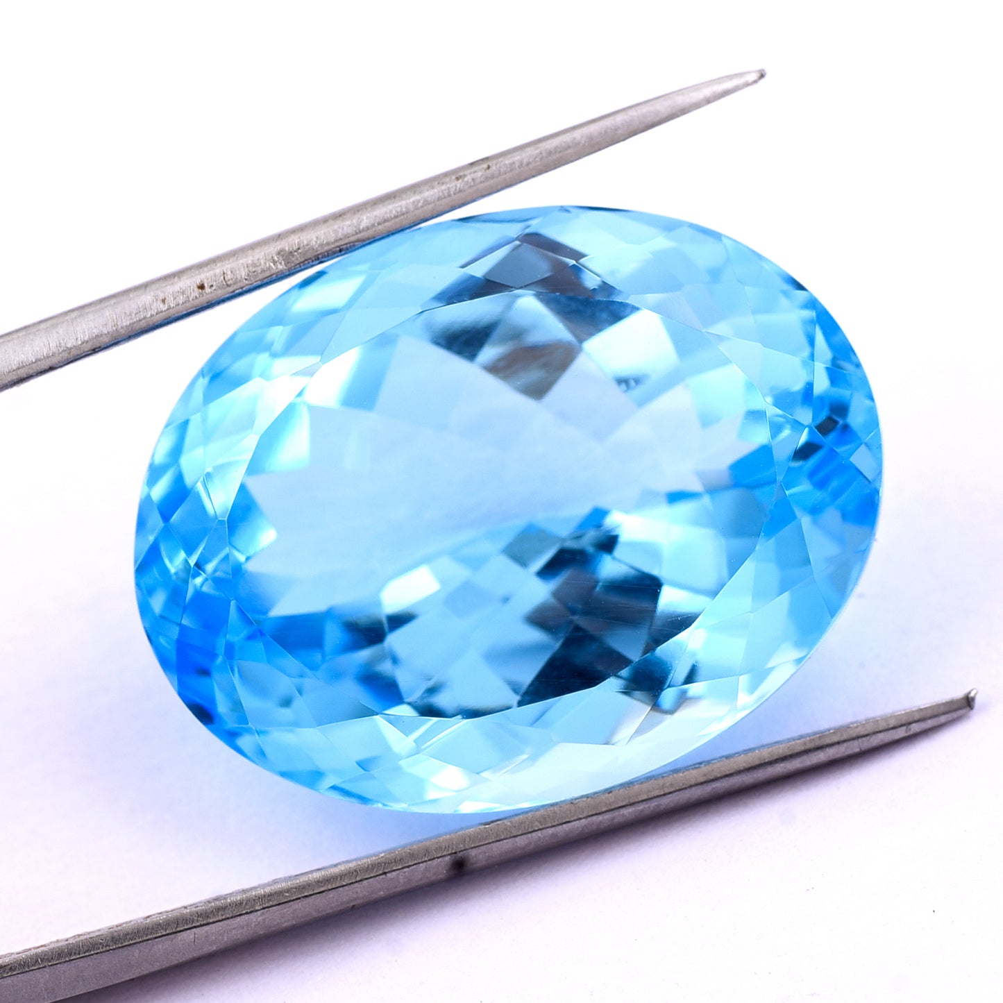 46.33 Natural Blue Topaz Oval Mixed Cut Gemstone