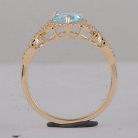1.87 Ct Pear Blue Topaz 9K Gold Ring