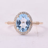 2.24 Ct Oval Blue Topaz 9K Gold Ring