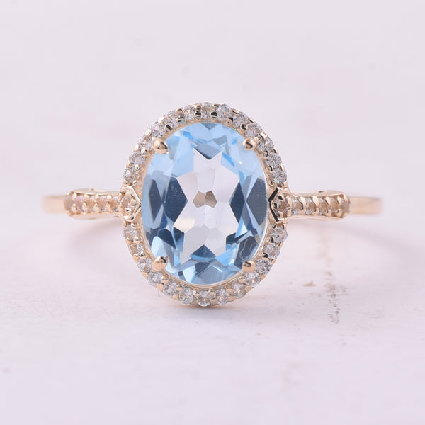 2.24 Ct Oval Blue Topaz 9K Gold Ring