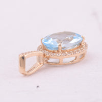2.26 Ct Oval Blue Topaz 9K Gold Pendant