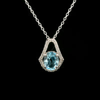1.61 Ct Oval Blue Topaz, White Zircon 925 Sterling Silver Pendant
