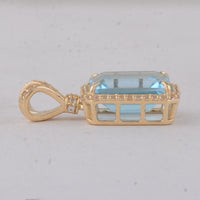 4.25 Ct Octagon Blue Topaz 9K Gold Pendant