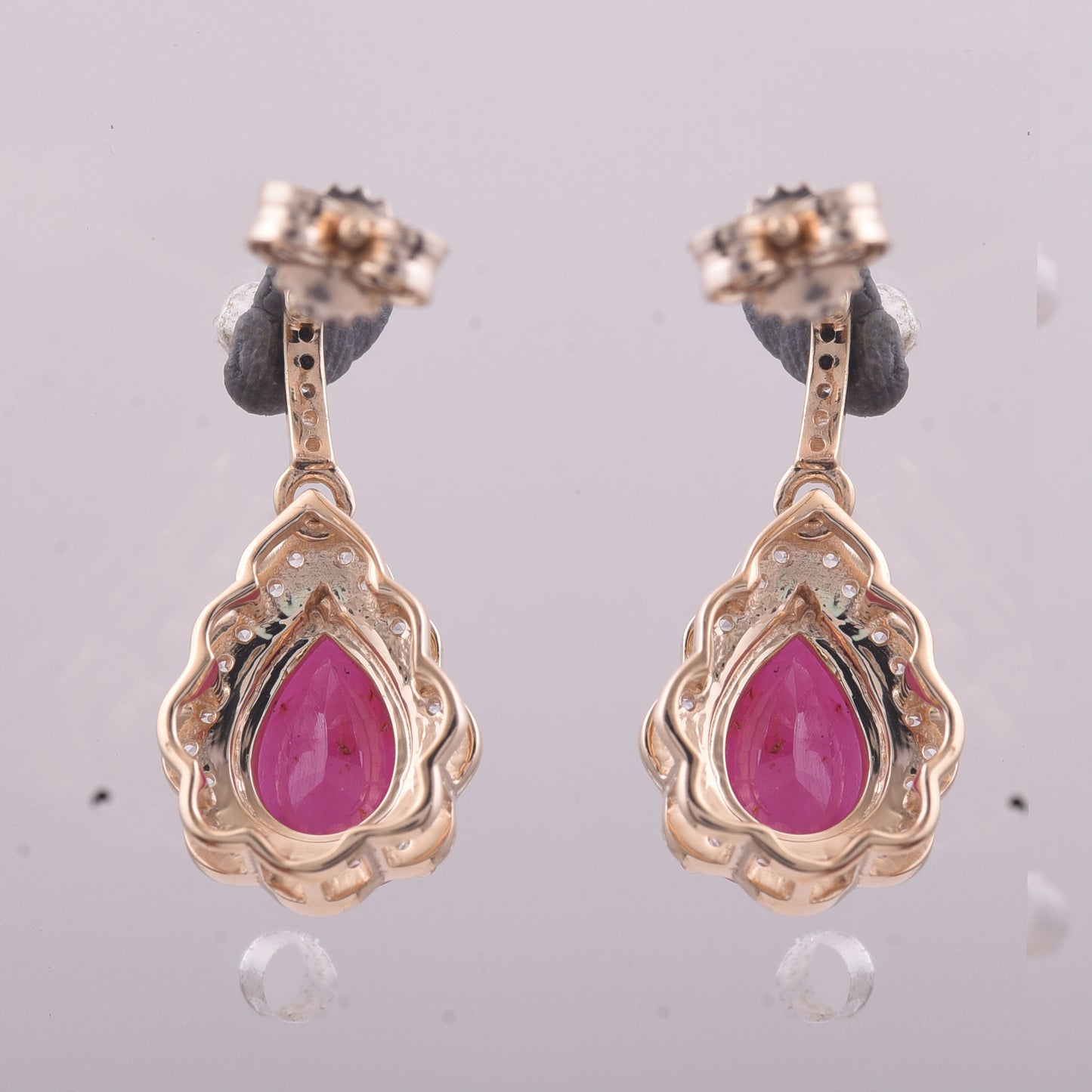 2.64 Ct Pear Ruby 9K Gold Earrings