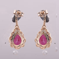 2.64 Ct Pear Ruby 9K Gold Earrings