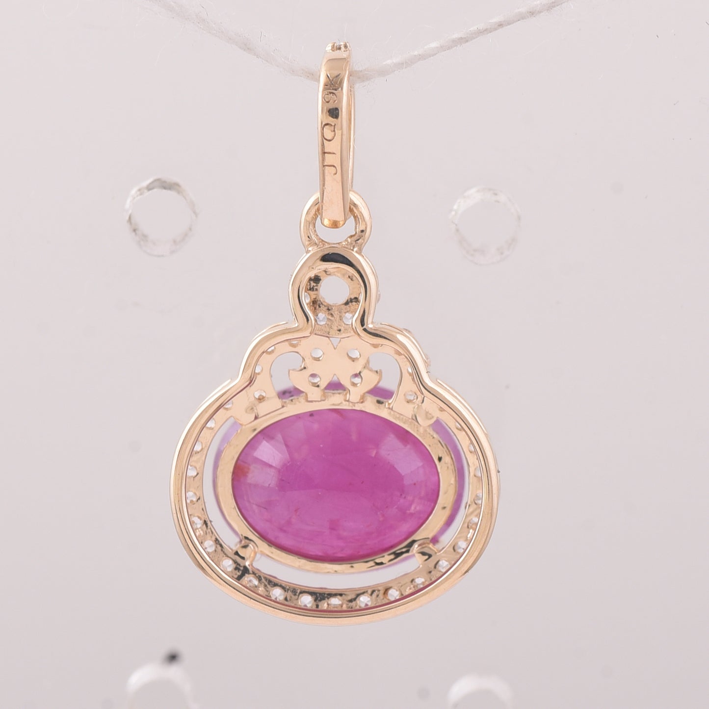 2.81 Ct Oval Ruby 9K Gold Pendant
