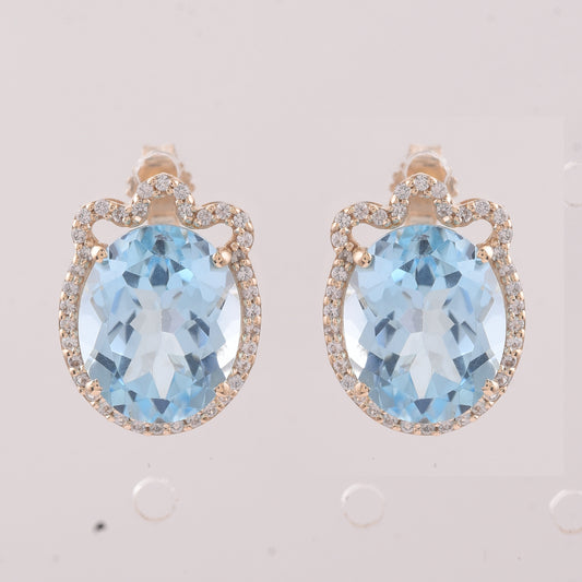 9.24 Ct Oval Blue Topaz 9K Gold Earrings