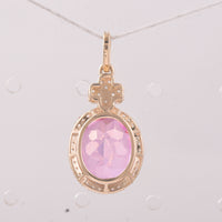 6.52 Ct Oval Pink Topaz 9K Gold Pendant