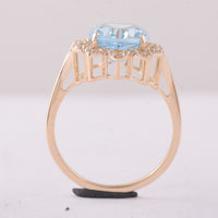 4.72 Ct Oval Blue Topaz 9K Gold Ring