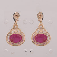5.39 Ct Oval Ruby 9K Gold Earrings