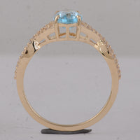 1.60 Ct Oval Blue Topaz 9K Gold Ring