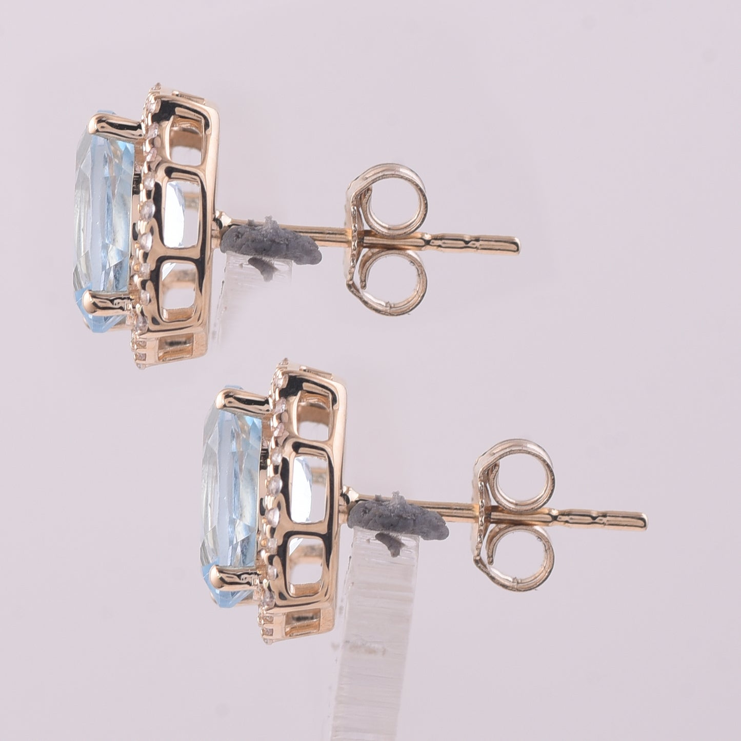 3.14 Ct Oval Blue Topaz 9K Gold Earrings