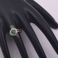 0.90 Ct Round Emerald 9K Gold Ring