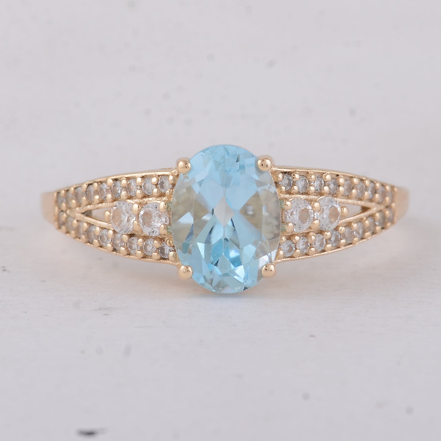 1.75 Ct Oval Blue Topaz 9K Gold Ring