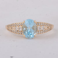1.75 Ct Oval Blue Topaz 9K Gold Ring