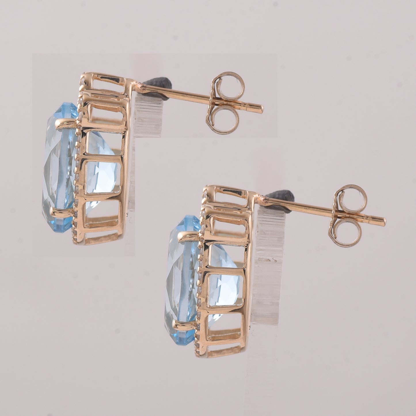 9.24 Ct Oval Blue Topaz 9K Gold Earrings