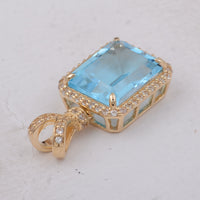 4.25 Ct Octagon Blue Topaz 9K Gold Pendant
