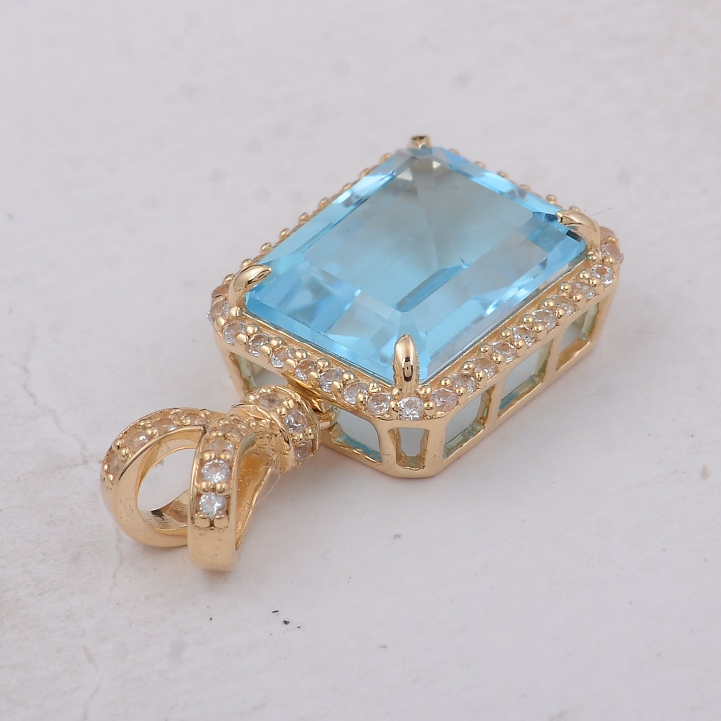 4.25 Ct Octagon Blue Topaz 9K Gold Pendant
