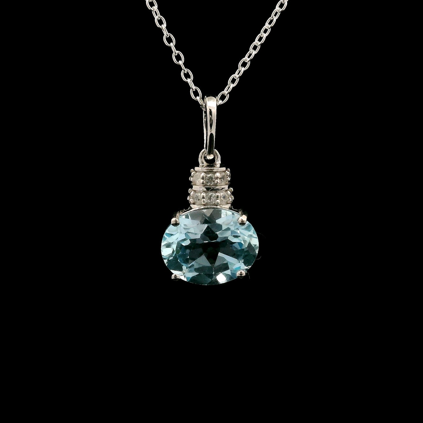 3.18 Ct Oval Blue Topaz, White Zircon 925 Sterling Silver Pendant