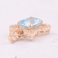 1.38 Ct Octagon Blue Topaz 9K Gold Pendant