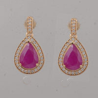 2.57 Ct Pear Ruby 9K Gold Earrings