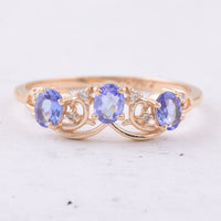 0.52 Ct Oval Natural Tanzanite 14K Gold Ring