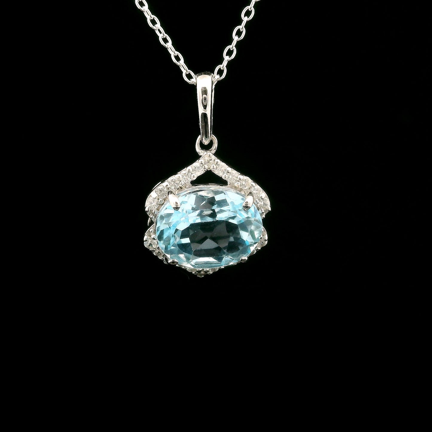 3.51 Ct Oval Blue Topaz, White Zircon 925 Sterling Silver Pendant