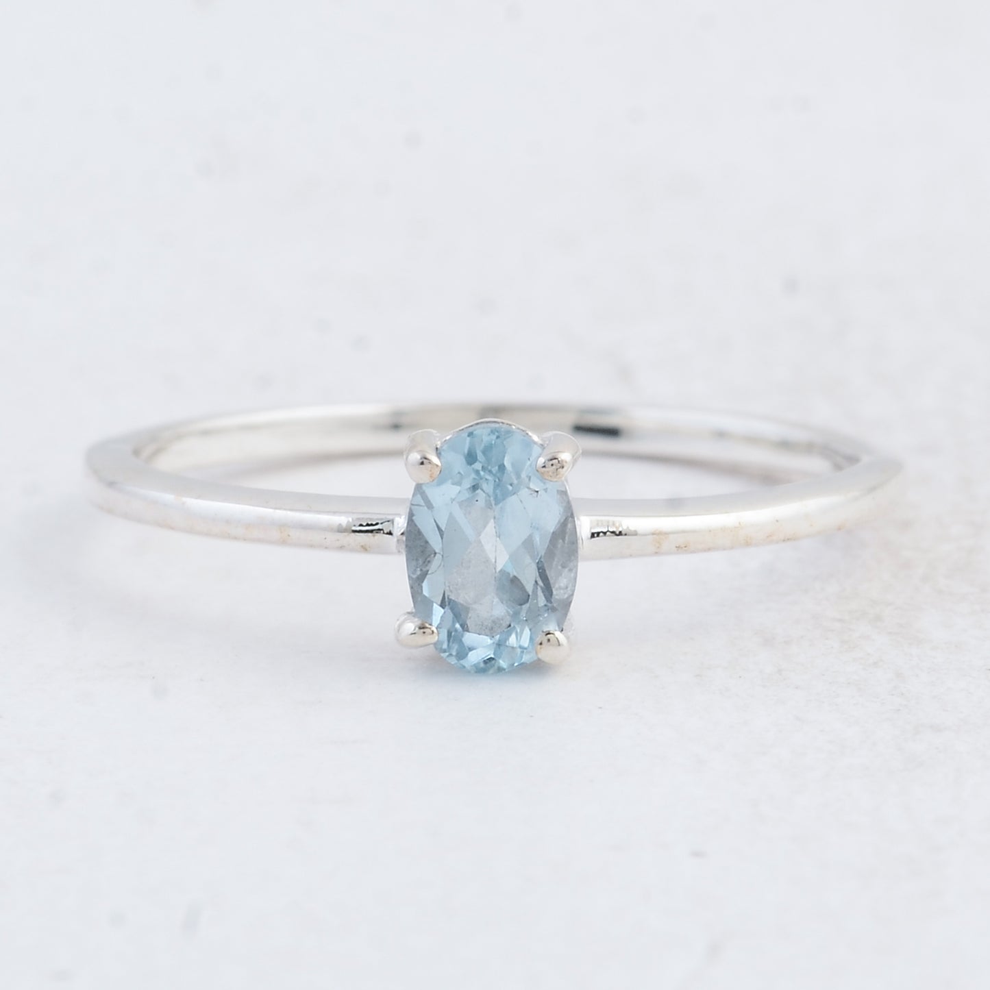 0.45 Ct Oval Swiss Blue Topaz 925 Sterling Silver Ring