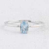 0.45 Ct Oval Swiss Blue Topaz 925 Sterling Silver Ring