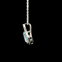 1.61 Ct Oval Blue Topaz, White Zircon 925 Sterling Silver Pendant