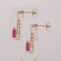 5.39 Ct Oval Ruby 9K Gold Earrings