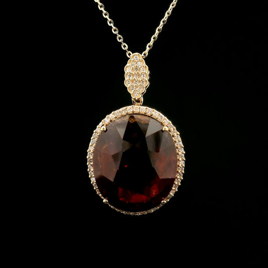 14.59 Ct Oval Hessonite 14K Gold Pendant