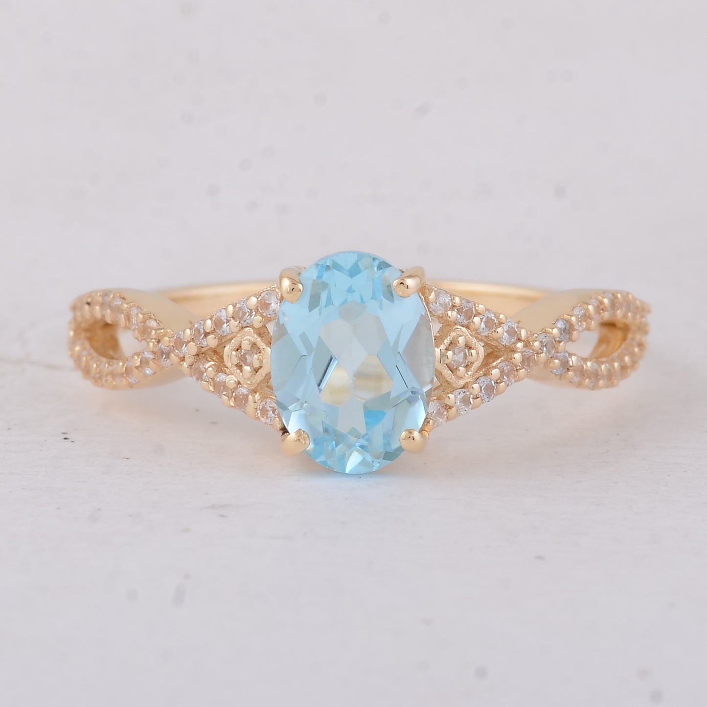 1.60 Ct Oval Blue Topaz 9K Gold Ring