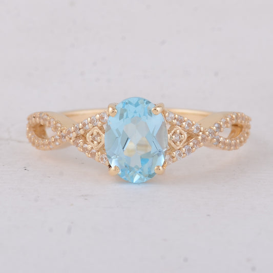 1.60 Ct Oval Blue Topaz 9K Gold Ring