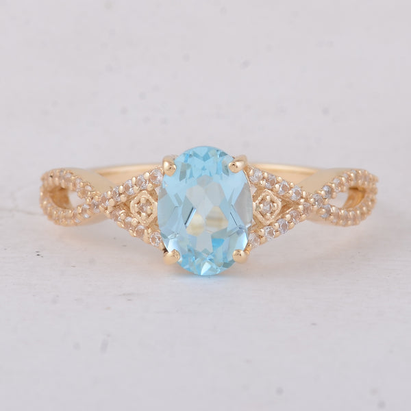 1.60 Ct Oval Blue Topaz 9K Gold Ring