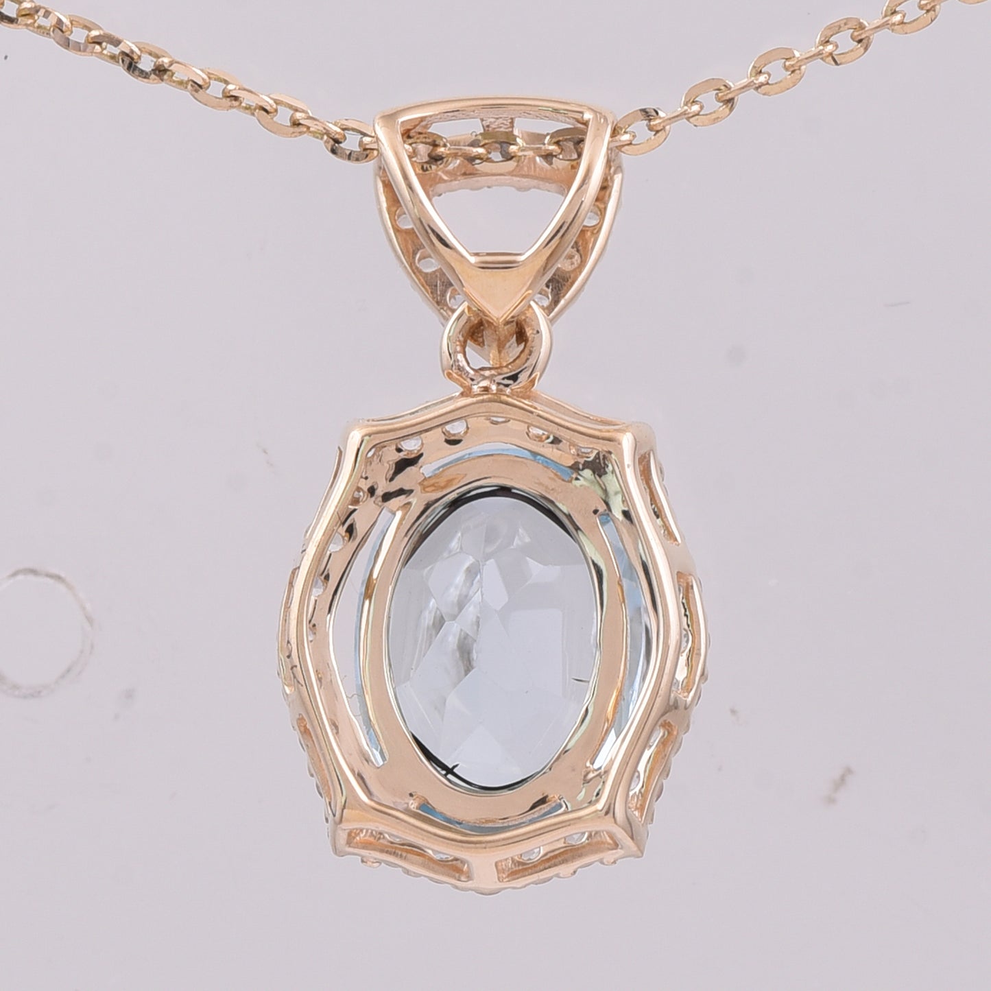 1.55 Ct Oval Blue Topaz 9K Gold Pendant