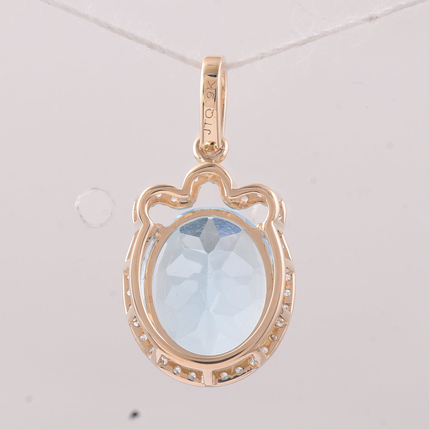 4.64 Ct Oval Blue Topaz 9K Gold Pendant