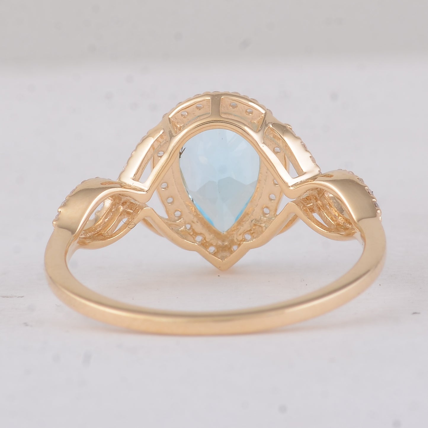 1.87 Ct Pear Blue Topaz 9K Gold Ring
