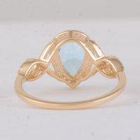 1.87 Ct Pear Blue Topaz 9K Gold Ring