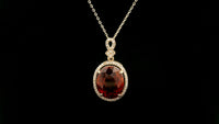 6.20 Ct Oval Hessonite 14K Gold Pendant