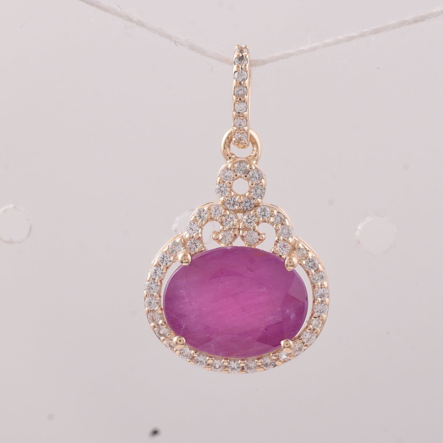 2.81 Ct Oval Ruby 9K Gold Pendant